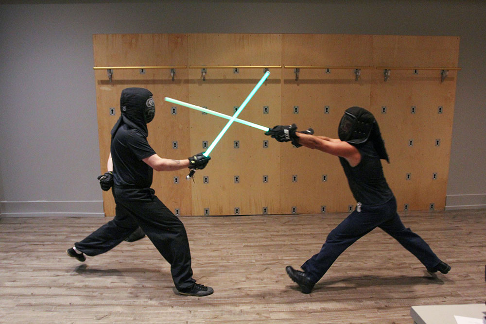 Chad Eisner (left) sparring with one of his students. 