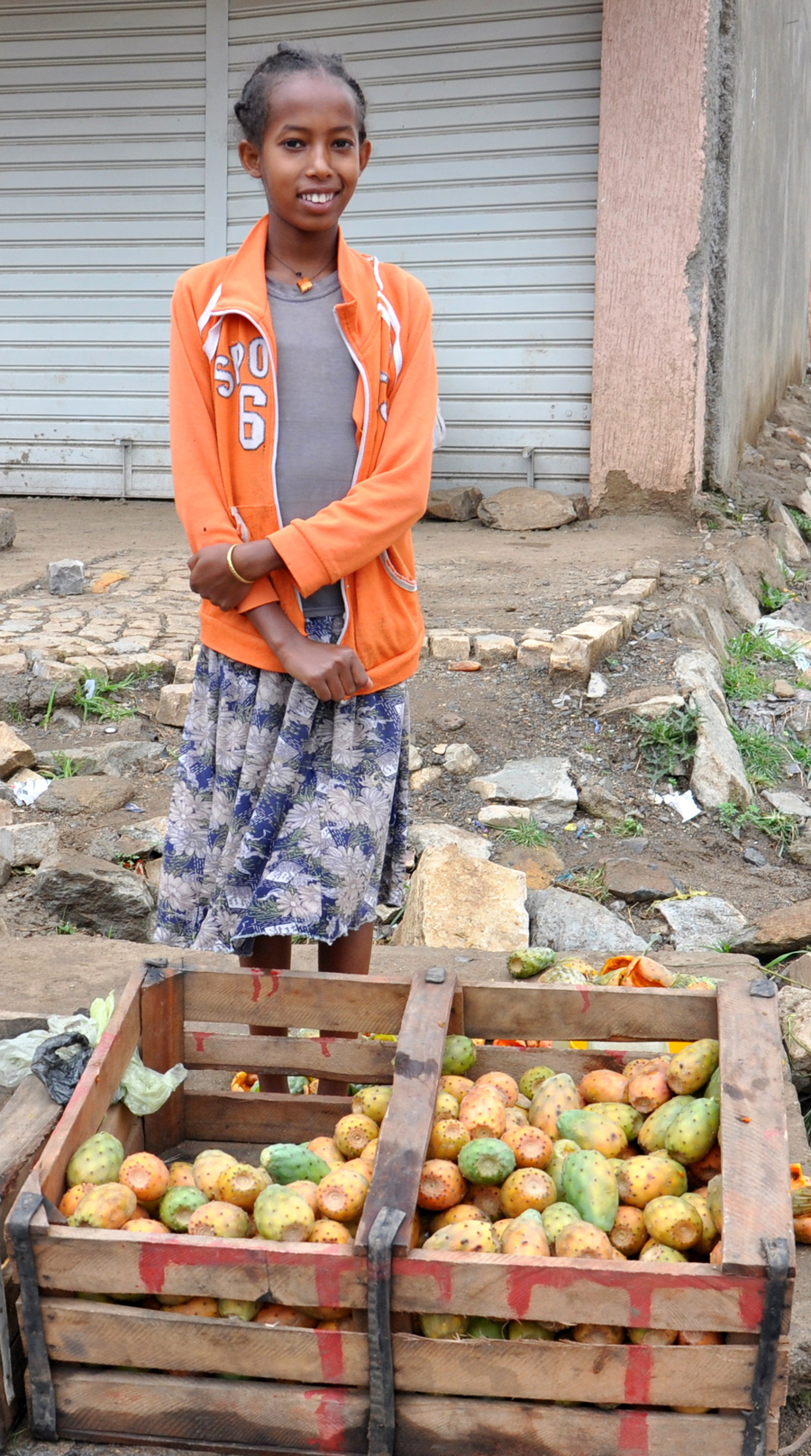 Girl in Wukro selling Beles, aka prickly pear cactus